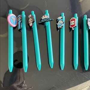 2 Teal Pens with Nurse-Themed Toppers, doctors, ambulance - buyers choice